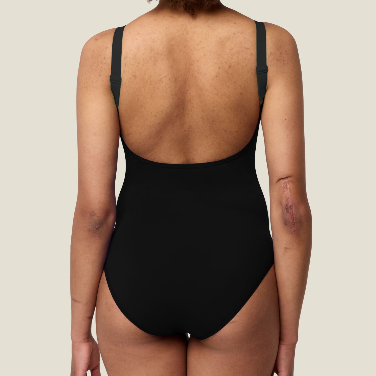 Back view of WUKA Adjustable Scoopback Period Swimsuit — low back and adjustable straps for comfort.